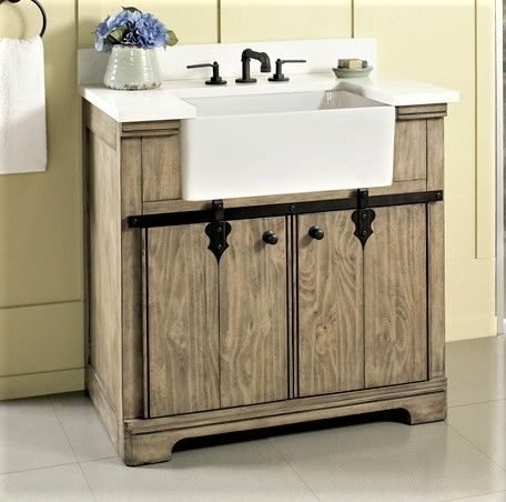 Reclaimed wood farmhouse vanity with an apron-front sink and matte black faucet