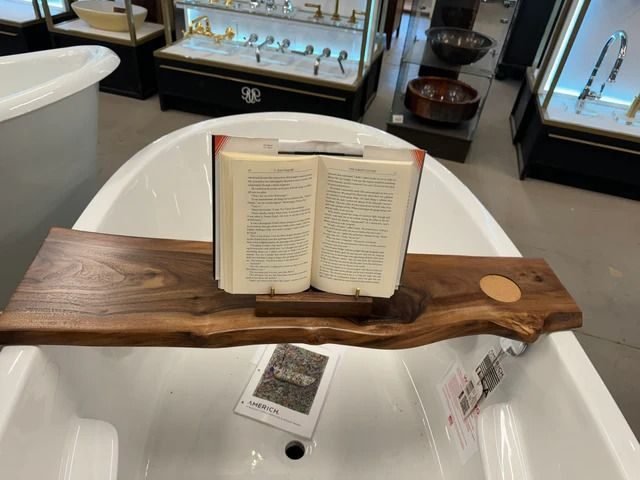 Walnut bathtub caddy with book rest in the PoshHaus showroom
