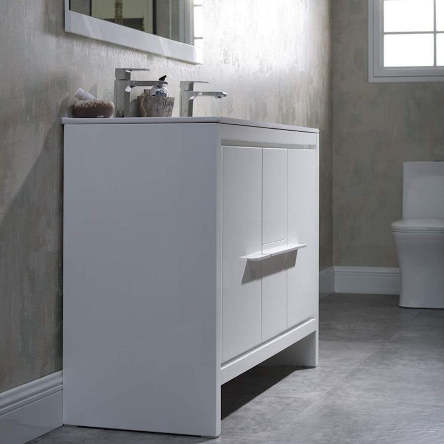 White Blossom vanity with chrome faucets in a grey bath