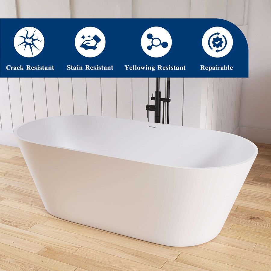 White oval freestanding tub with black floor faucet