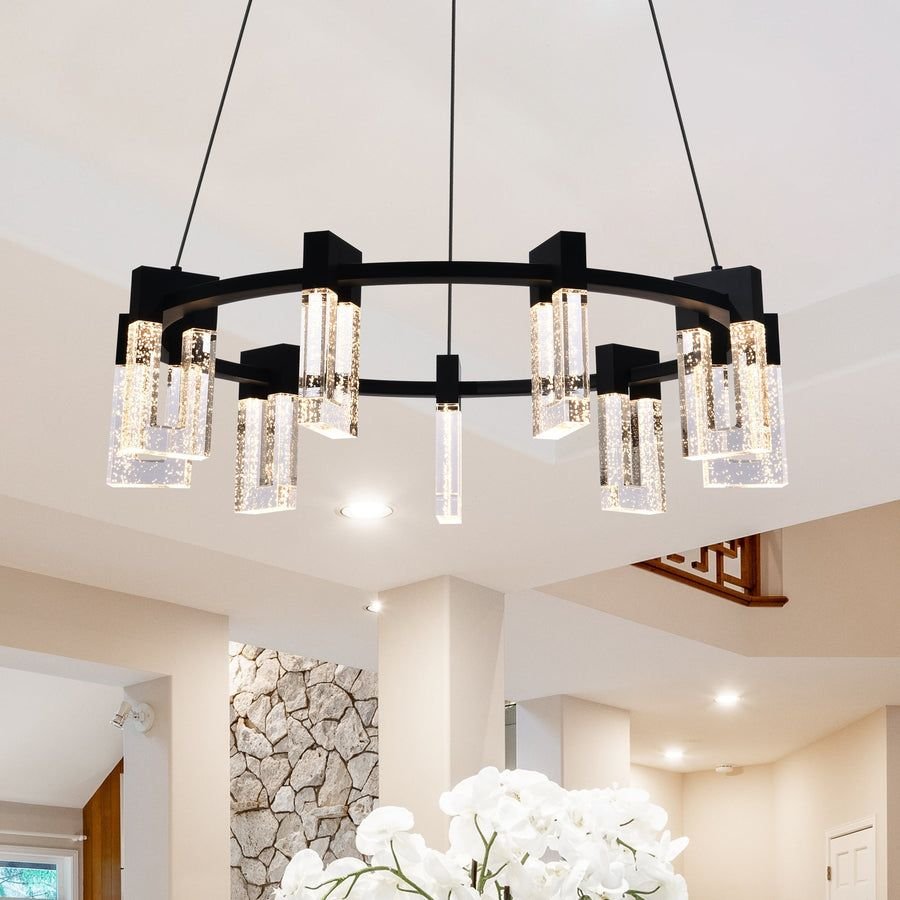 Black ring chandelier with sparkling glass lights in a bright room