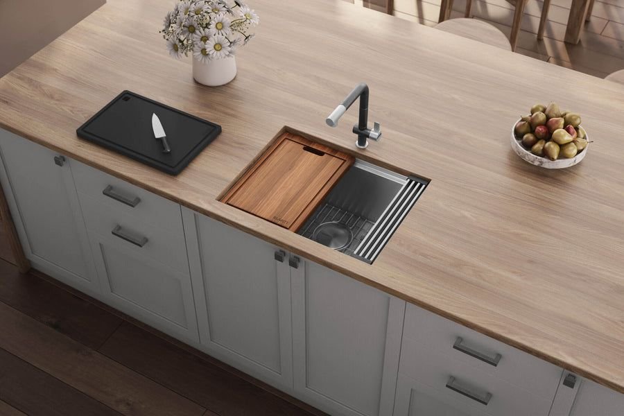 Pale wood counter with a Ruvati workstation sink