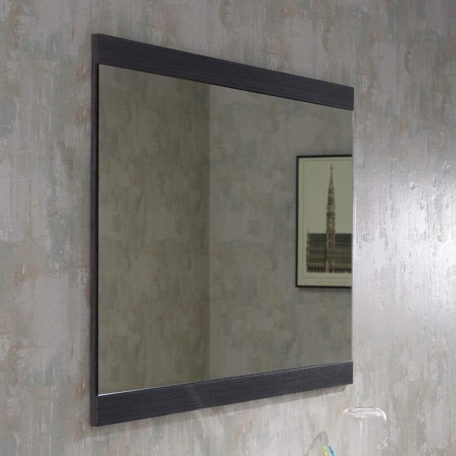 Rectangular bathroom mirror against a textured gray wall