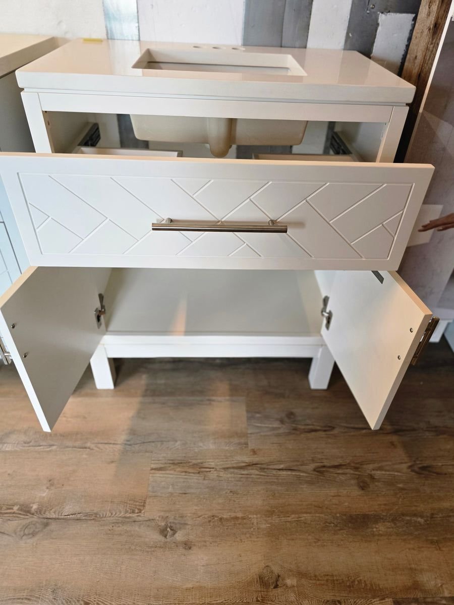 Bathroom idea with the 30" White Kohler Vanity with Custom Marble Top, Showroom