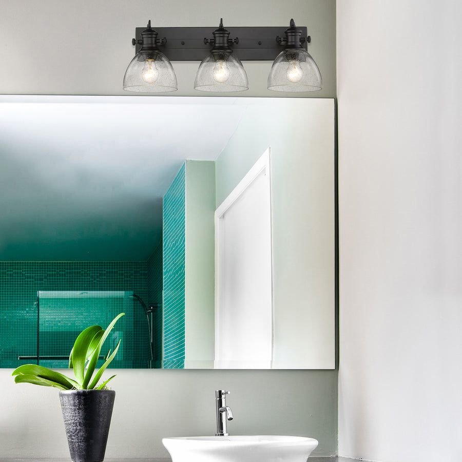 Bathroom idea with the Hines 3-Light Bath Vanity in Matte Black with Seeded Glass, Golden Lighting