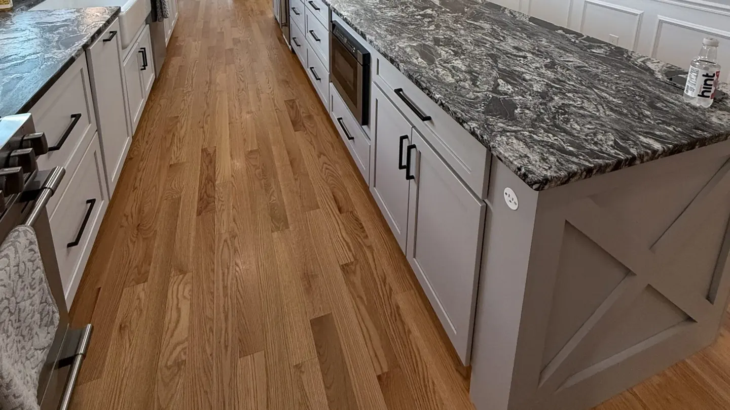 Stone island installed on a farmhouse cabinet base