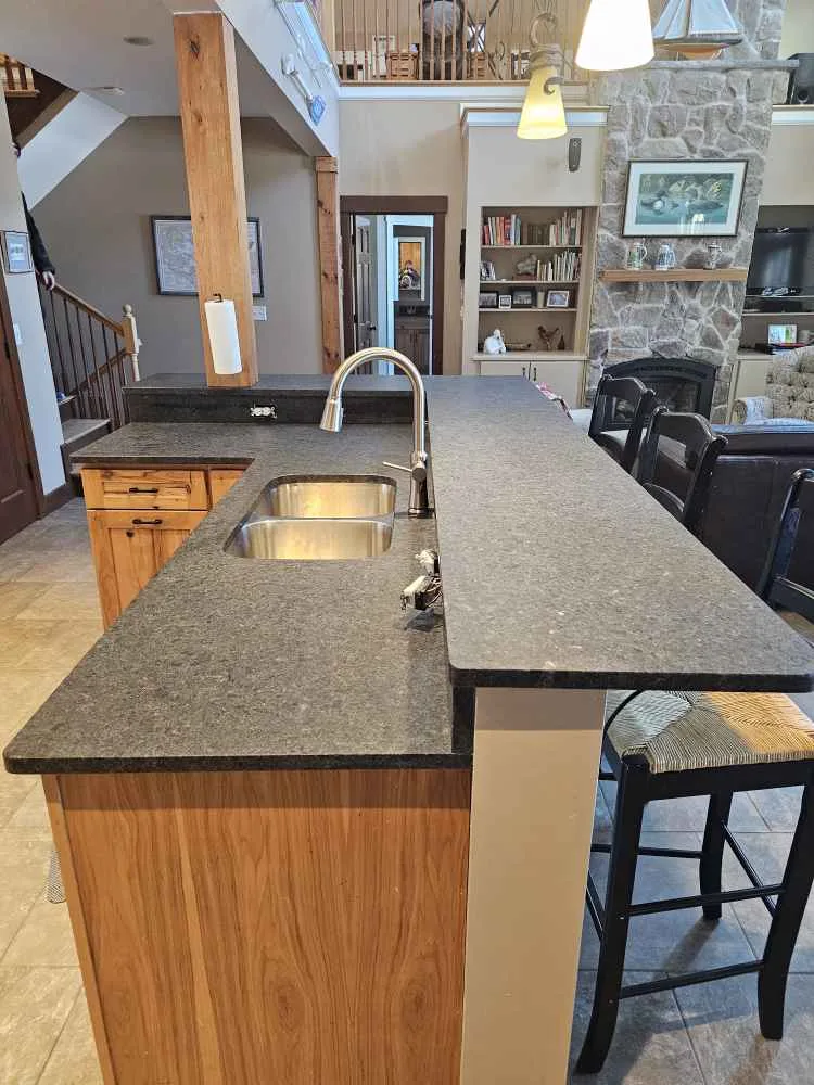 Leathered granite raised bar island