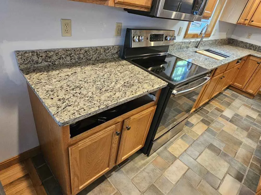Santa Cecilia granite counters on oak cabinets