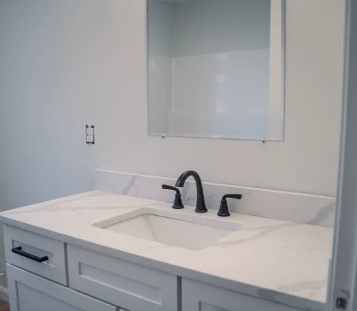 White quartz vanity top with an undermount basin